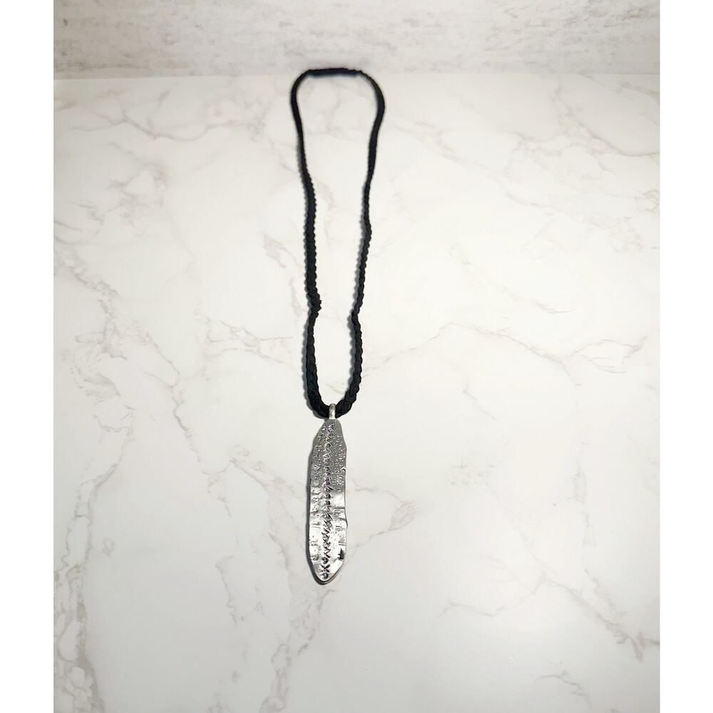 URBAN OUTFITTERS Unisex stamped metal pendant feather shape braided leather cord